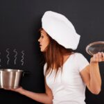 Induction cookware set with magnetic compatible pots and pans on induction cooktop