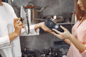 Best cookware for induction cooktops – All-Clad, Lodge, Caraway, and Cuisinart sets on glass cooktop
