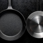 Hard-anodized vs stainless steel cookware comparison – two pans side by side