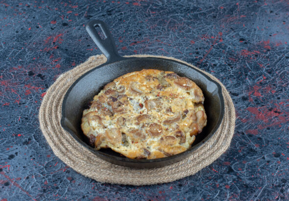 Eggs cooking in a nonstick ceramic frying pan