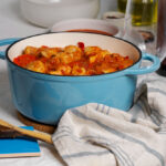 Enameled cast iron Dutch oven on a kitchen stovetop