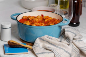 Enameled cast iron Dutch oven on a kitchen stovetop